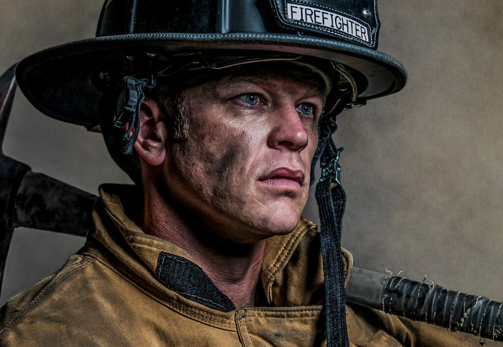 Close up of firemen's eyes showing tears
